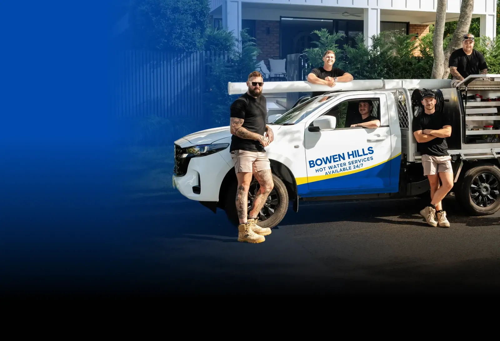 Bowen Hills Hot Water Services team with the ute